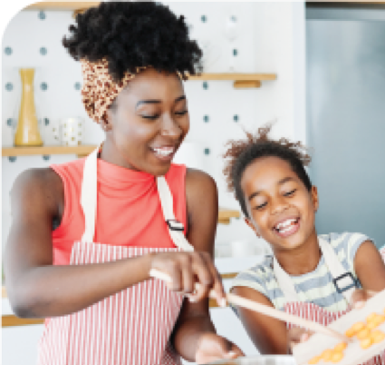 Mother and daughter baking plant-based dessert